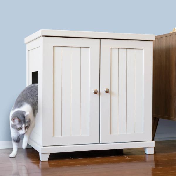 litter box cabinet with gray and white cat exiting the cabinet